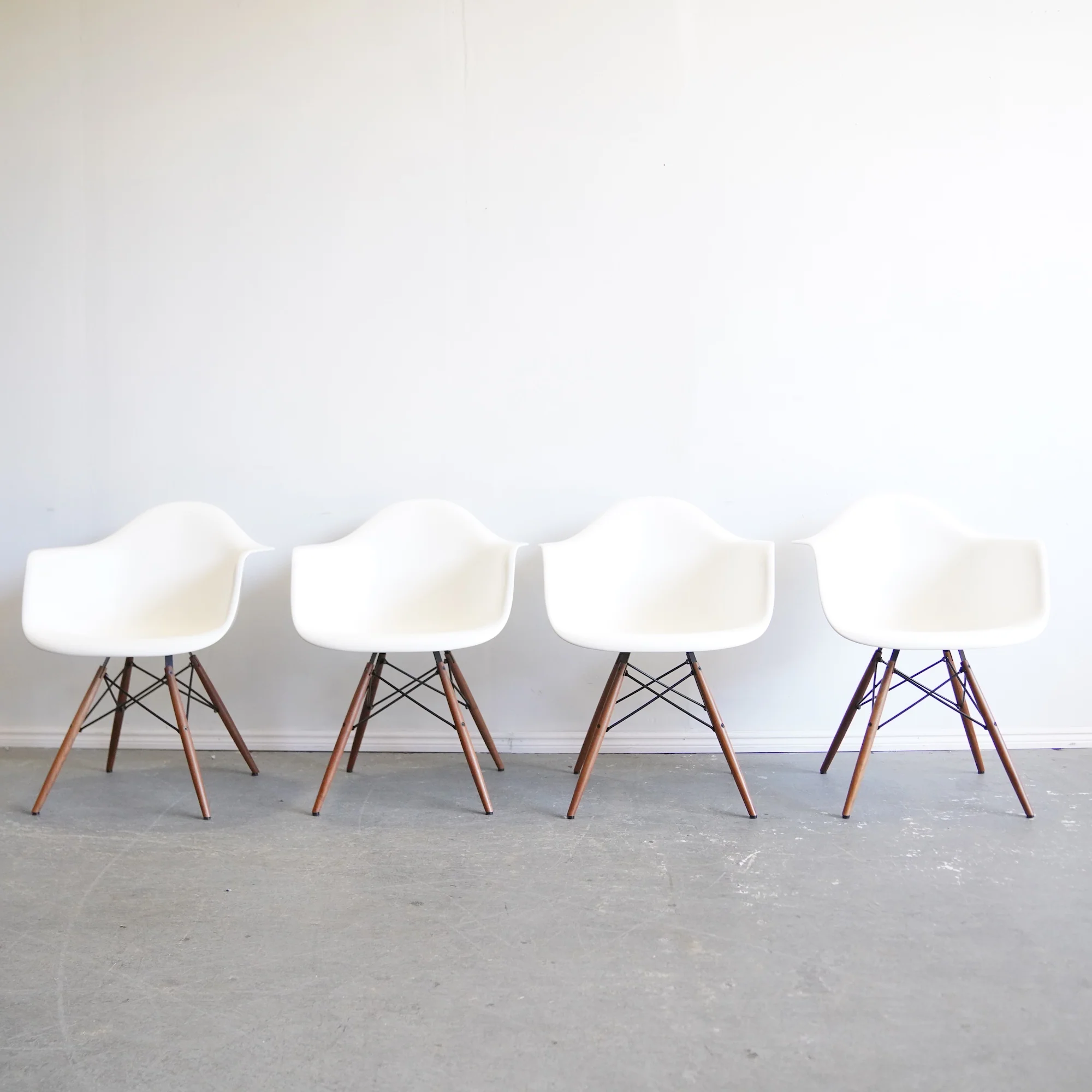 Authentic Herman Miller Eames Molded Armchair with wood base