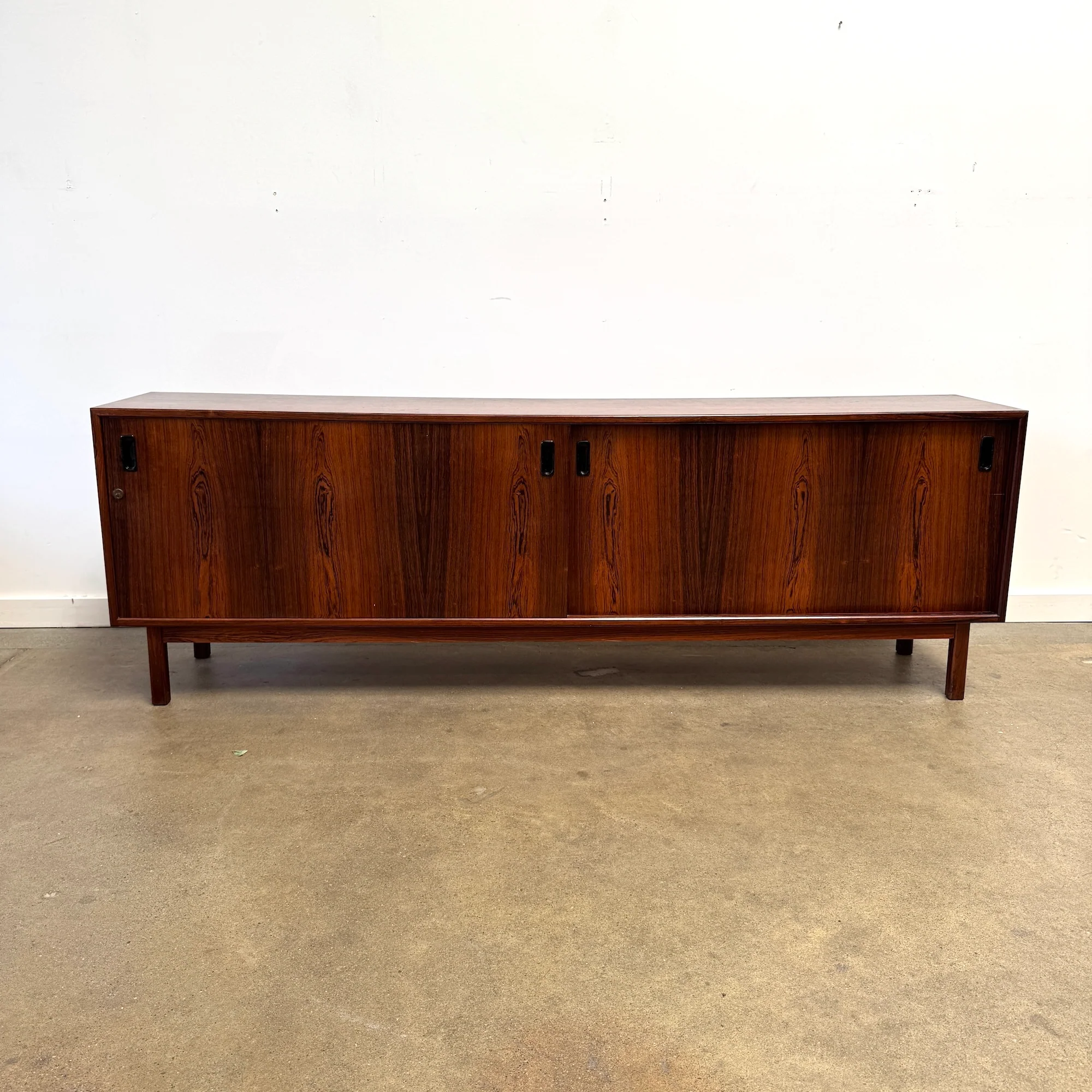 Danish Modern Rosewood Credenza with Sliding Doors and Adjustable Shelves