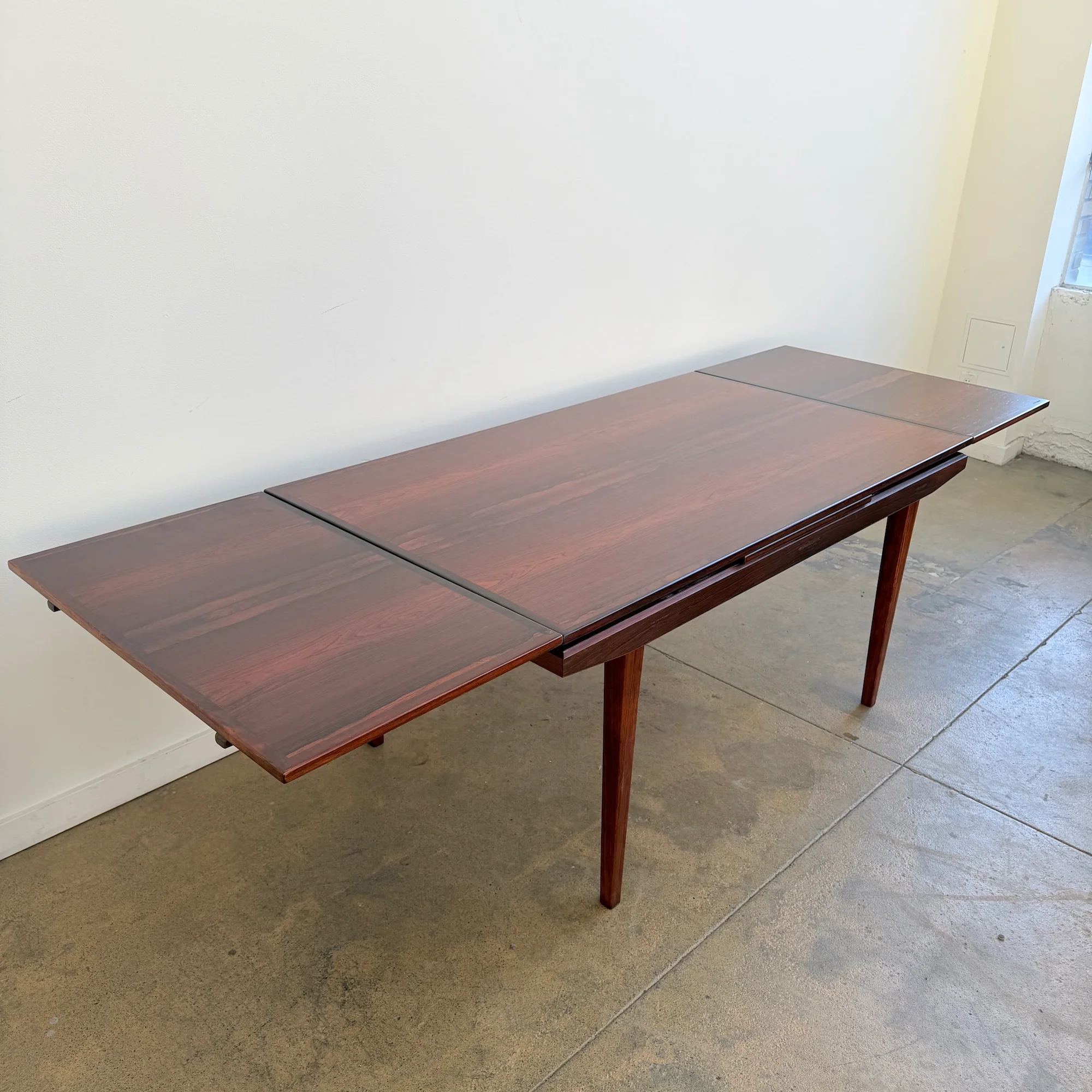 Danish Modern Rosewood Expandable Dining Table by Johannes Andersen