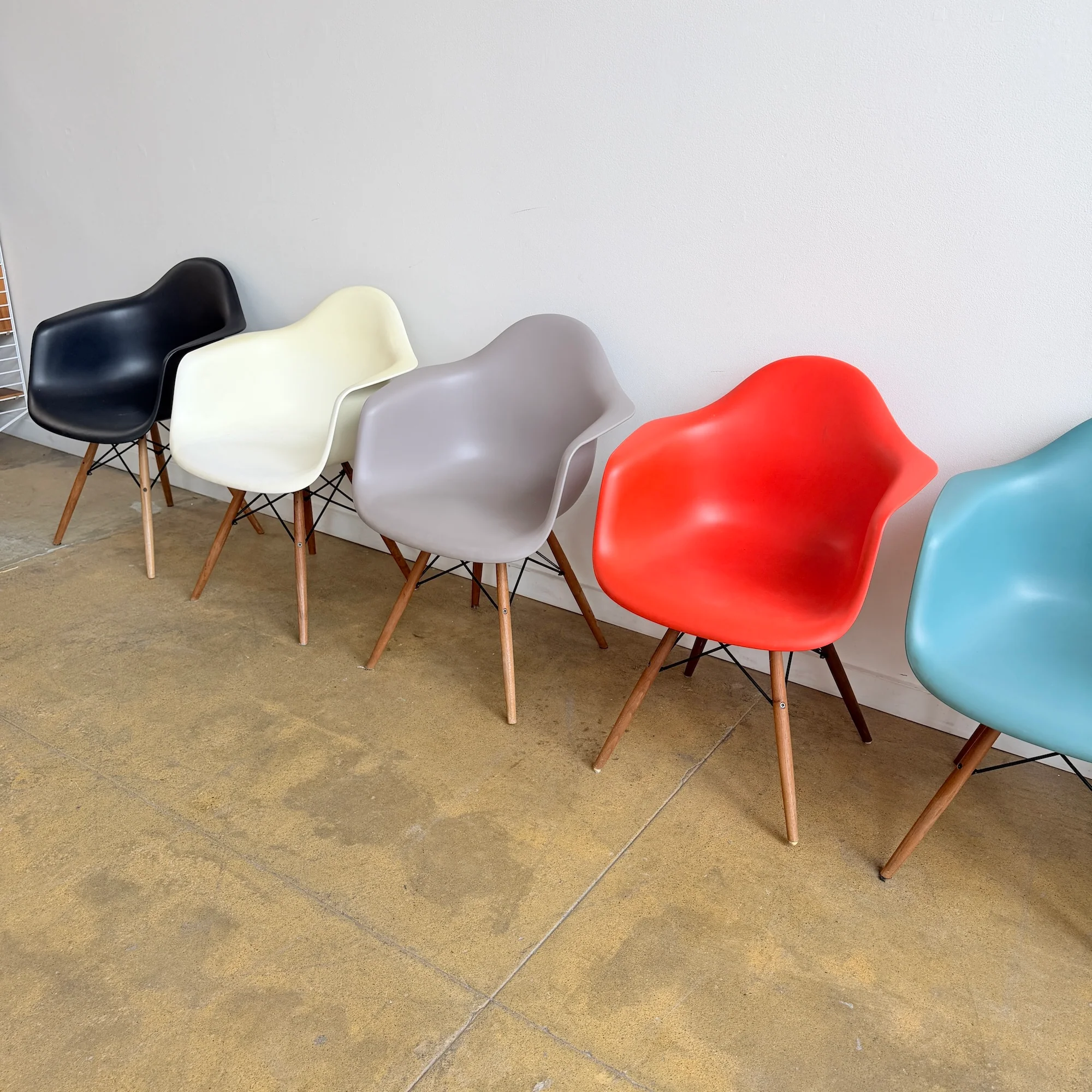 Vitra Eames Molded Plastic Armchair with Walnut Dowel Base - Set of 6 - Image 4